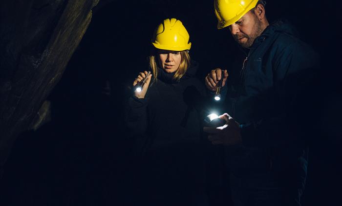 Inspecting items left behind by the miners with Corris Mine Explorers
